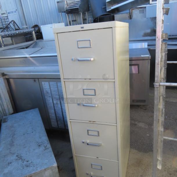 One 4 Drawer Metal File Cabinet. 15X25X52 - Image 1 of 1
