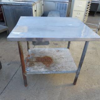 One Stain;ess Steel Table With Under Shelf. #TSW-3036E. 30X36X33