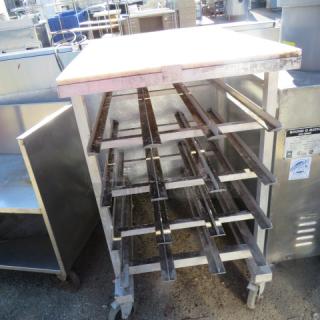 One Aluminum Can Rack With Cutting Board Top On Casters. 25X34.5X41.5