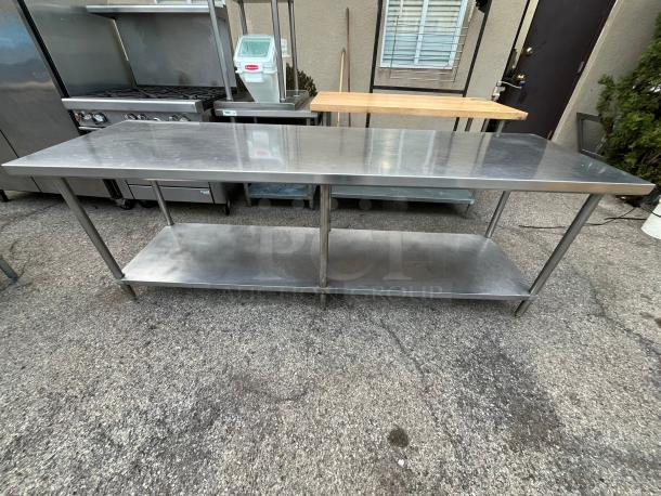 GREAT AND STABLE STAINLESS STEEL TABLE WITH EXTRA BOTTOM SHELF STORAGE - Image 1 of 2