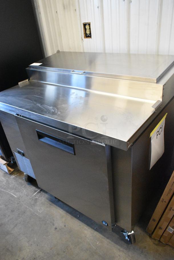 BRAND NEW SCRATCH AND DENT! 2024 Hoshizaki PR46B Stainless Steel Commercial 46" 1 Door Refrigerated Pizza Prep Table on Commercial Casters. 115 Volts, 1 Phase. Tested and Powers On But Does Not Get Cold - Image 1 of 7
