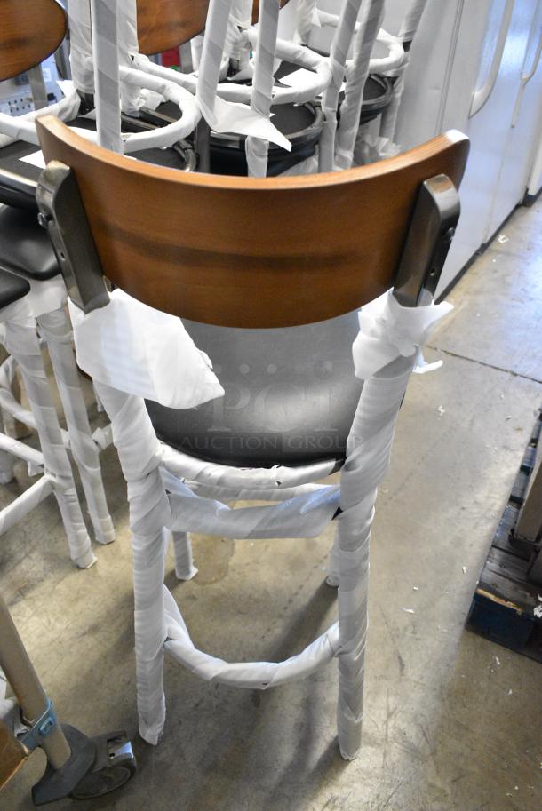 8 BRAND NEW SCRATCH AND DENT! Lancaster Table & Seating 164BBMRNG  Boomerang Series Black Finish Bar Stool with Black Vinyl Seat and Antique Walnut Wood Back. 8 Times Your Bid! - Image 3 of 5