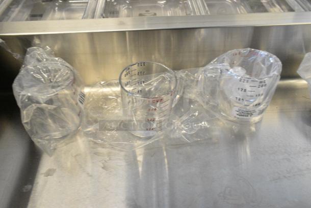 8 Various BRAND NEW SCRATCH AND DENT! Items Including Stainless Steel Cylindrical Drop In Bin, Stainless Steel Drop In Bin, FCCLBLU Knob, Poly Liquid Measuring Cups. 8 Times Your Bid! - Image 2 of 8