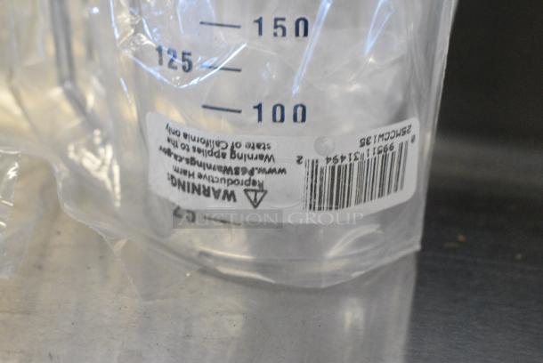 8 Various BRAND NEW SCRATCH AND DENT! Items Including Stainless Steel Cylindrical Drop In Bin, Stainless Steel Drop In Bin, FCCLBLU Knob, Poly Liquid Measuring Cups. 8 Times Your Bid! - Image 4 of 8