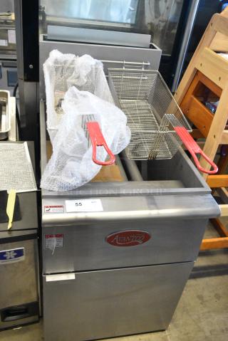 BRAND NEW SCRATCH AND DENT! 2024 Avantco 177FF100N Stainless Steel Commercial Floor Style Natural Gas Powered 100 Pound Capacity Deep Fat Fryer w/ 2 Metal Fry Baskets. 150,000 BTU.