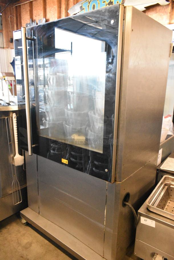 Fri-jado TDR7-P Stainless Steel Commercial Electric Powered Rotisserie Oven on Commercial Casters. 208 Volts, 3 Phase. - Image 1 of 6