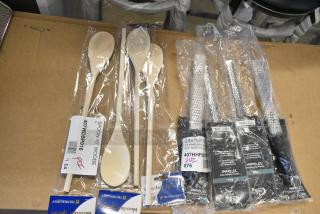 8 BRAND NEW SCRATCH AND DENT! Items Including 2 407WDSP016 Thunder Group 16" Wooden Spoon, 4 407HHFINEGTR Choice 13" Stainless Steel Fine Handheld Grater with Non-Slip Black Handle. 8 Times Your Bid!