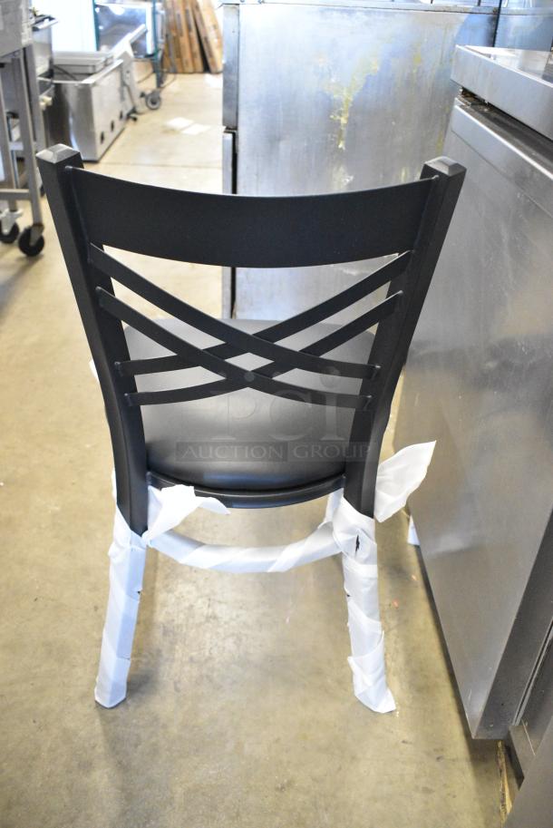 24 BRAND NEW SCRATCH AND DENT! Lancaster Table & Seating 164CCROSSFR Black Cross Back Chair Frame and 7 Boxes of 4 Lancaster Table & Seating 164CUSHMTLBK 2 1/2" Black Vinyl Padded Seat for Metal Frame Seating. 24 Times Your Bid! - Image 3 of 5