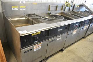 Giles EOF-20W Stainless Steel Commercial Electric Powered 3 Bay Deep Fat Fryer w/ Dumping Station on Commercial Casters. 480 Volts, 3 Phase.