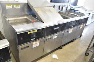Giles EOF-20W Stainless Steel Commercial Electric Powered 3 Bay Deep Fat Fryer w/ Dumping Station on Commercial Casters. 480 Volts, 3 Phase.