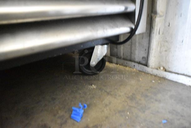 2021 True T-23-HC Stainless Steel Commercial Single Door Reach In Cooler w/ Poly Coated Racks on Commercial Casters. 115 Volts, 1 Phase. Tested and Working! - Image 3 of 5