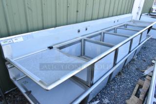 BRAND NEW SCRATCH AND DENT! Regency 600S42424224 Stainless Steel Commercial 4 Bay Sink w/ Dual Drain Boards. No Legs. - Item #1155228