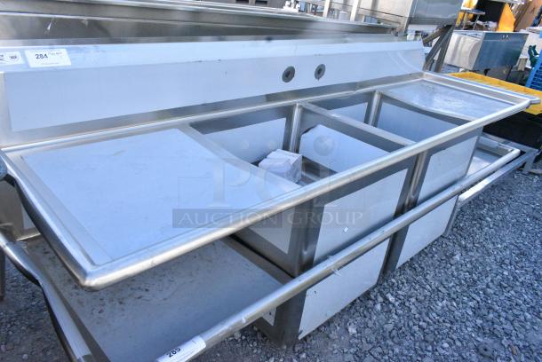 BRAND NEW SCRATCH AND DENT! Regency 600S22323224 96" 16 Gauge Stainless Steel Two Compartment Sink with Galvanized Steel Legs and 2 Drainboards - 23" x 23" x 12" Bowls. No Legs. - Image 1 of 4