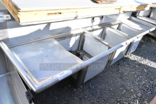 BRAND NEW SCRATCH AND DENT! Regency 600S31717218 Stainless Steel 3 Bay Sink w/ Dual Drain Boards. No Legs. - Item #1155265