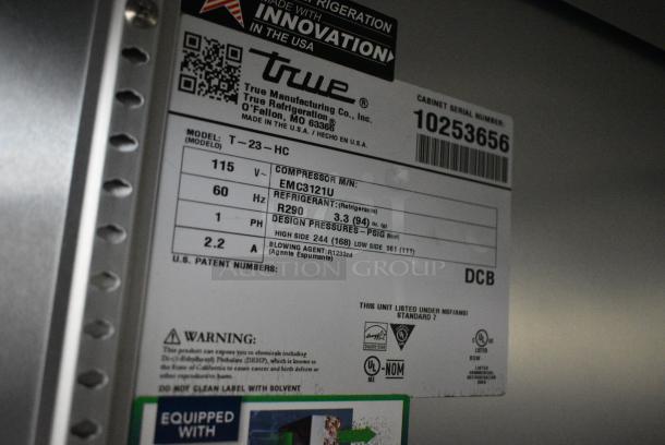 2021 True T-23-HC Stainless Steel Commercial Single Door Reach In Cooler w/ Poly Coated Racks on Commercial Casters. 115 Volts, 1 Phase. Tested and Working! - Image 6 of 7