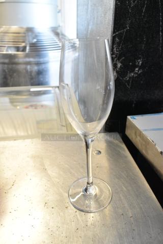 Box of 24 Arcoroc Malea Flute Glasses.