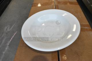 Box of Tuxton White Ceramic Pasta Plates