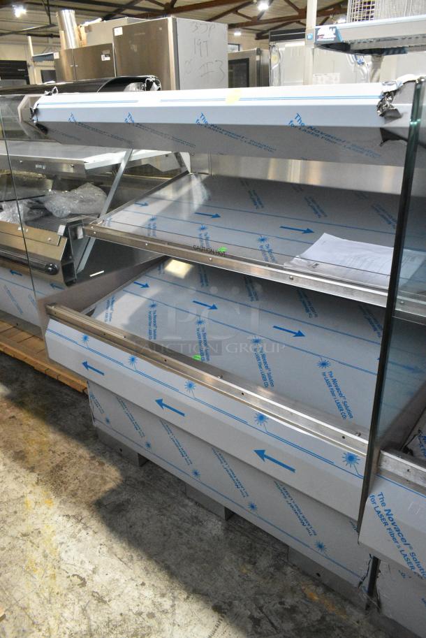 BRAND NEW! 2016 BKI HSS4-2TSQ Stainless Steel Commercial Floor Style 2 Tier Warming Display Case Merchandiser. 230 Volts, 1 Phase. - Image 1 of 4