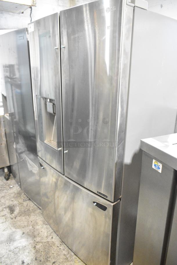 BRAND NEW SCRATCH AND DENT! LG Stainless Steel Cooler w/ Freezer and Water/Ice Dispenser. Tested and Powers On But Does Not Get Cold - Image 1 of 9