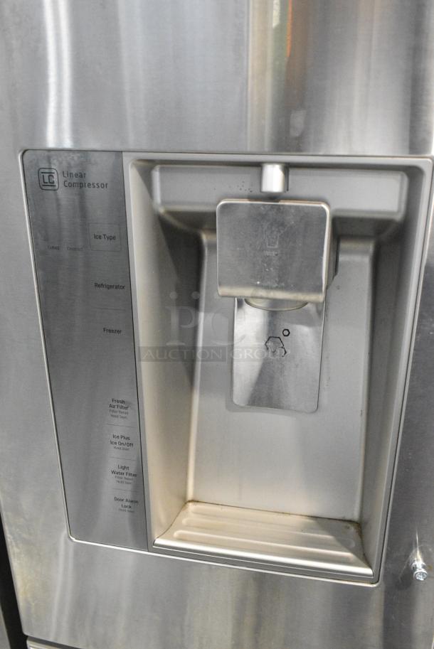 BRAND NEW SCRATCH AND DENT! LG Stainless Steel Cooler w/ Freezer and Water/Ice Dispenser. Tested and Powers On But Does Not Get Cold - Image 3 of 9