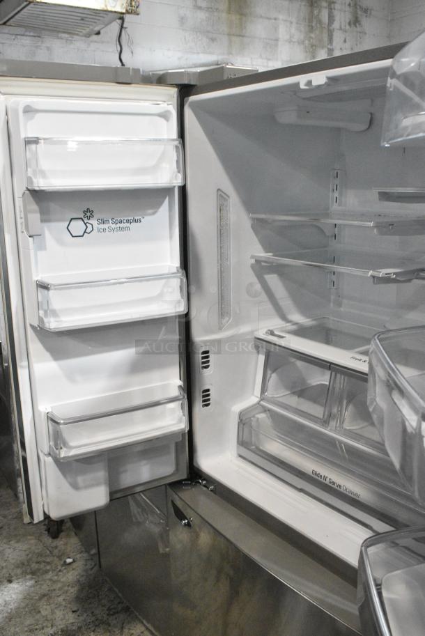 BRAND NEW SCRATCH AND DENT! LG Stainless Steel Cooler w/ Freezer and Water/Ice Dispenser. Tested and Powers On But Does Not Get Cold - Image 4 of 9