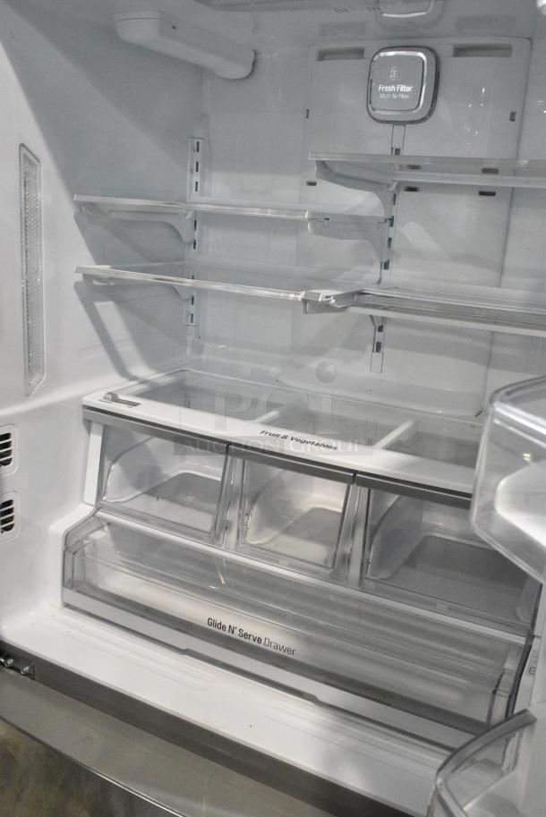 BRAND NEW SCRATCH AND DENT! LG Stainless Steel Cooler w/ Freezer and Water/Ice Dispenser. Tested and Powers On But Does Not Get Cold - Image 5 of 9