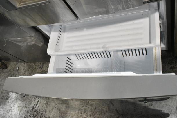 BRAND NEW SCRATCH AND DENT! LG Stainless Steel Cooler w/ Freezer and Water/Ice Dispenser. Tested and Powers On But Does Not Get Cold - Image 7 of 9