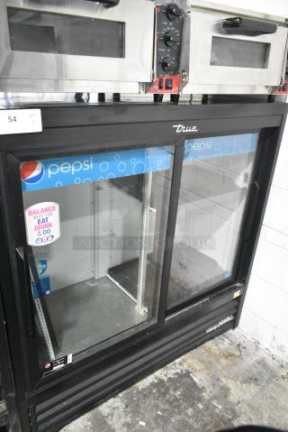 2021 True GDM-41SL-48-HC-LD Metal Commercial 2 Door Reach In Cooler Merchandiser w/ Poly Coated Racks. 115 Volts, 1 Phase. Tested and Powers On But Does Not Get Cold