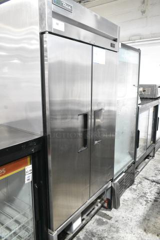 2018 True T-35-HC Stainless Steel Commercial 2 Door Reach In Cooler w/ Poly Coated Racks on Commercial Casters. 115 Volts, 1 Phase. Tested and Powers On But Does Not Get Cold