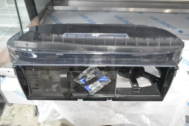 BRAND NEW SCRATCH AND DENT! Tork Poly Wall Mount Toilet Paper Dispenser - Image 3 of 4