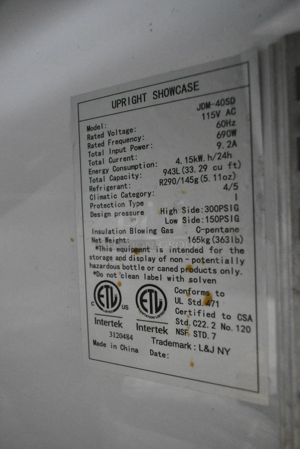 JDM-40SD Metal Commercial 2 Door Reach In Cooler Merchandiser w/ Poly Coated Racks on Commercial Casters. 115 Volts, 1 Phase. Tested and Working! - Image 7 of 7