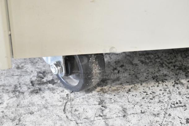 Uline H-959 Metal Semi Automatic Poly Strapping Machine on Commercial Casters. 115 Volts, 1 Phase. Tested and Working! - Image 7 of 8