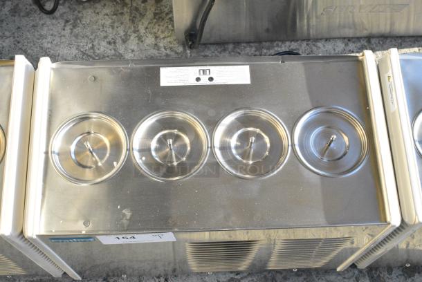 BRAND NEW SCRATCH AND DENT! 2021 Crathco E47/E49-4 Stainless Steel Commercial Countertop 4 Section Refrigerated Beverage Machine Base. 115 Volts, 1 Phase. Tested and Working! - Image 3 of 4