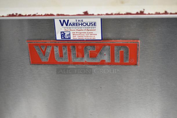 Vulcan 60FTL Stainless Steel Commercial Propane Gas Powered 6 Burner Range w/ Right Side Flat Top Griddle, 2 Ovens and Back Splash. - Image 2 of 9