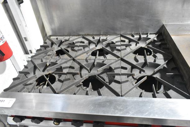 Vulcan 60FTL Stainless Steel Commercial Propane Gas Powered 6 Burner Range w/ Right Side Flat Top Griddle, 2 Ovens and Back Splash. - Image 4 of 9