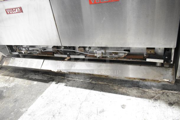 Vulcan 60FTL Stainless Steel Commercial Propane Gas Powered 6 Burner Range w/ Right Side Flat Top Griddle, 2 Ovens and Back Splash. - Image 8 of 9