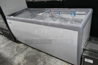 BRAND NEW SCRATCH AND DENT! Avantco 360DFF20HCL 70 7/8" Customizable Flat Top Display Ice Cream Freezer on Commercial Casters. 115 Volts, 1 Phase. Tested and Working!