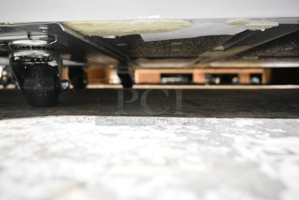 BRAND NEW SCRATCH AND DENT! Avantco 360DFF20HCL 70 7/8" Customizable Flat Top Display Ice Cream Freezer on Commercial Casters. 115 Volts, 1 Phase. Tested and Working! - Image 3 of 7