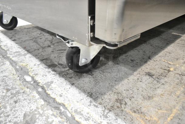 BRAND NEW SCRATCH AND DENT! 2023 Migali C-2F-HC Stainless Steel Commercial 2 Door Reach In Freezer w/ Poly Coated Racks on Commercial Casters. Serial  C-2F-HC003230311092C0017. 115 Volts, 1 Phase. Tested and Working! - Image 4 of 7