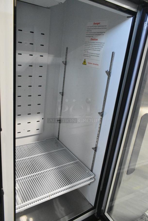 BRAND NEW SCRATCH AND DENT! 2022 Migali C-49RM-HC Metal Commercial 2 Door Reach In Cooler Merchandiser w/ Poly Coated Racks on Commercial Casters. Serial C-49RM-HC003221012092C0001. 115 Volts, 1 Phase. Tested and Working! - Image 6 of 7