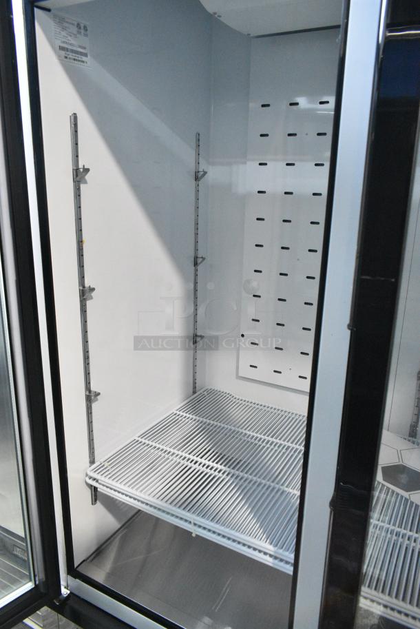 BRAND NEW SCRATCH AND DENT! 2021 Migali C-49RM-HC Metal Commercial 2 Door Reach In Cooler Merchandiser w/ Poly Coated Racks on Commercial Casters. Serial C-49RM-HCe003211113092C0004. 115 Volts, 1 Phase. Tested and Working! - Image 4 of 7