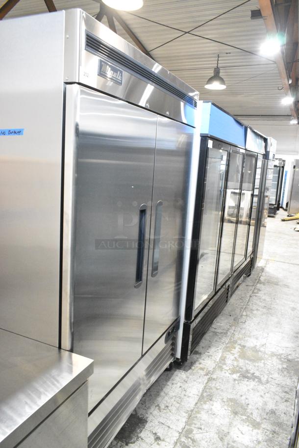 BRAND NEW SCRATCH AND DENT!  2023 Migali C-2RB-HC Stainless Steel Commercial 2 Door Reach In Cooler w/ Poly Coated Racks on Commercial Casters. Serial C-2RB-HCT03230617092T0005. 115 Volts, 1 Phase. Tested and Working! - Image 2 of 8