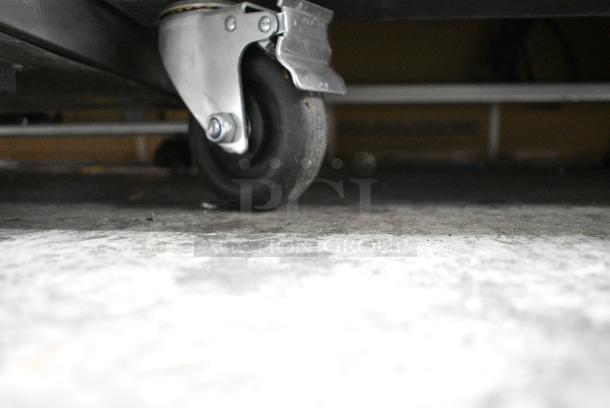 BRAND NEW SCRATCH AND DENT!  2023 Migali C-2RB-HC Stainless Steel Commercial 2 Door Reach In Cooler w/ Poly Coated Racks on Commercial Casters. Serial C-2RB-HCT03230617092T0005. 115 Volts, 1 Phase. Tested and Working! - Image 5 of 8