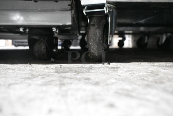 BRAND NEW SCRATCH AND DENT! 2023 Migali C-1FB-HC Stainless Steel Commercial Single Door Reach In Cooler w/ Poly Coated Racks on Commercial Casters. Serial C-1FB-HCT03230617092T0003. 115 Volts, 1 Phase. Tested and Working! - Image 4 of 6