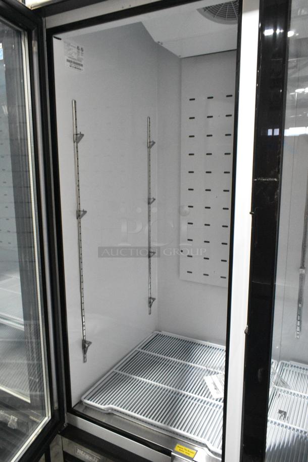 BRAND NEW SCRATCH AND DENT! 2022 Migali C-49FM-HCe Metal Commercial 2 Door Reach In Freezer Merchandiser w/ Poly Coated Racks on Commercial Casters. Serial C-49FM-HCe003221215092C0011. 115 Volts, 1 Phase. Tested and Working! - Image 5 of 7