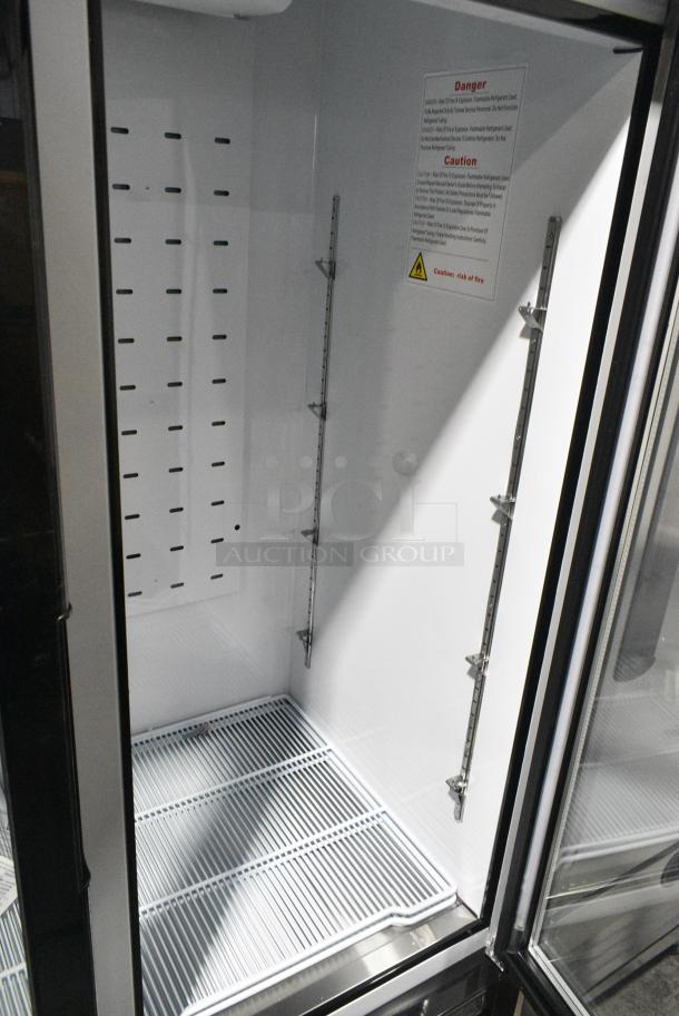 BRAND NEW SCRATCH AND DENT! 2022 Migali C-49FM-HCe Metal Commercial 2 Door Reach In Freezer Merchandiser w/ Poly Coated Racks on Commercial Casters. Serial C-49FM-HCe003221215092C0011. 115 Volts, 1 Phase. Tested and Working! - Image 6 of 7