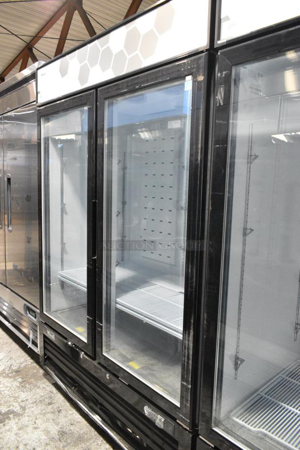 BRAND NEW SCRATCH AND DENT! 2022 Migali C-49FM-HCe Metal Commercial 2 Door Reach In Freezer Merchandiser w/ Poly Coated Racks on Commercial Casters. Serial C-49FM-HCe003220809092C0023. 115 Volts, 1 Phase. Tested and Working! - Image 2 of 7