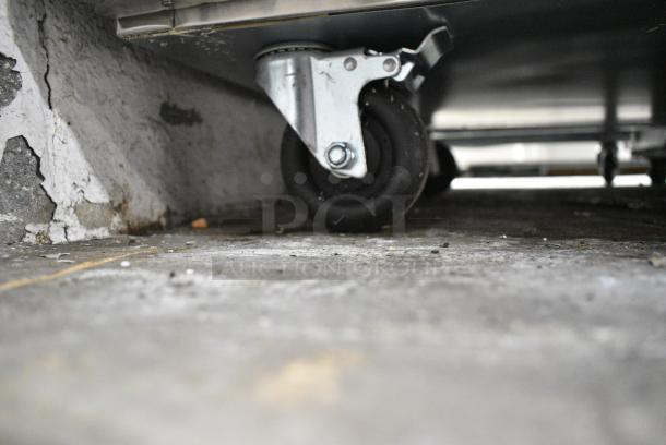 BRAND NEW SCRATCH AND DENT!  2023 Migali C-3F-HC Stainless Steel Commercial 3 Door Reach In Freezer w/ Poly Coated Racks on Commercial Casters. Serial  C-3F-HC003230505092C0004. 115 Volts, 1 Phase. Cannot Test Due To Plug Style - Image 4 of 8