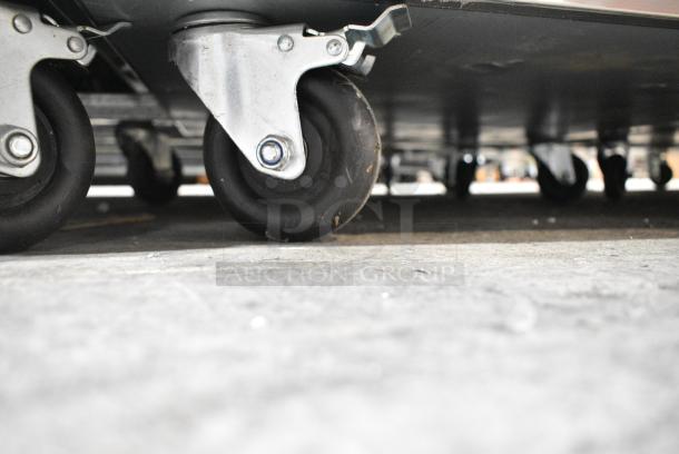 BRAND NEW SCRATCH AND DENT! 2023 Migali C-1F-HC Stainless Steel Commercial Single Door Reach In Freezer w/ Poly Coated Racks on Commercial Casters. Serial C-1F-HC003230623092C0023. 115 Volts, 1 Phase. Tested and Working! - Image 4 of 6