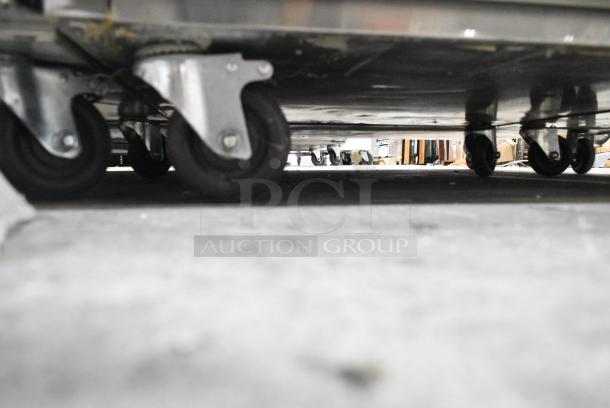 BRAND NEW SCRATCH AND DENT! 2023 Migali C-1F-HC Stainless Steel Commercial Single Door Reach In Cooler w/ Poly Coated Racks on Commercial Casters. Serial C-1F-HCT03230726092T0008. 115 Volts, 1 Phase. Tested and Working! - Image 4 of 6